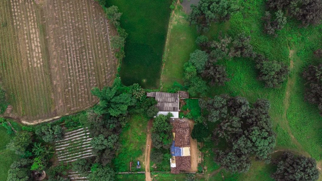 A frame from Panchayat Season 4 showing the village panchayat office at dusk.